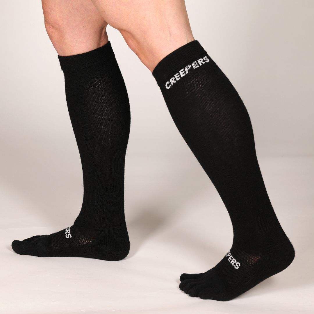 over the calf merino wool toe socks for skiing, hiking and travel